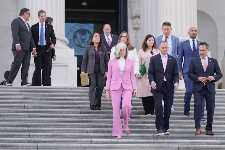 House Minority Leader Hakeem Jeffries, D-N.Y., first row center, and fellow Democrats arrive for a news conference Wednesday at the U.S. Capitol.