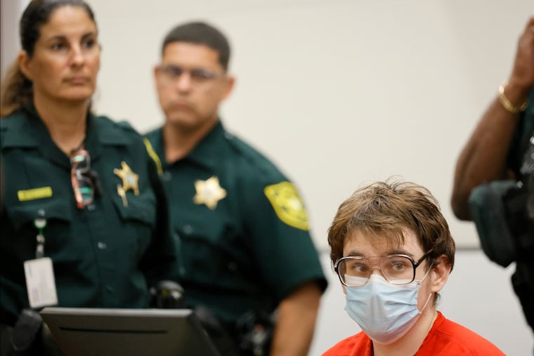 Nikolas Cruz sits at the defense table during a victim impact statements at his sentencing hearing in Fort Lauderdale, Fla. Cruz was sentenced to life in prison for murdering 17 people.