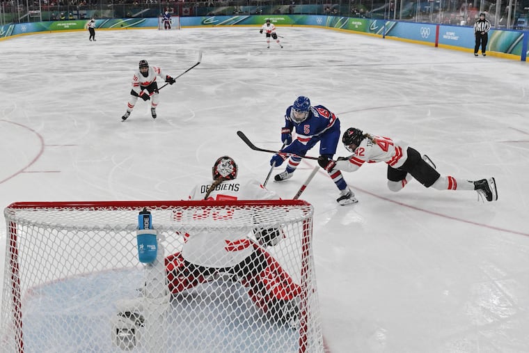 United States defenseman Megan Keller (5) scored the OT winner against Canada in Thursday's gold-medal game.
