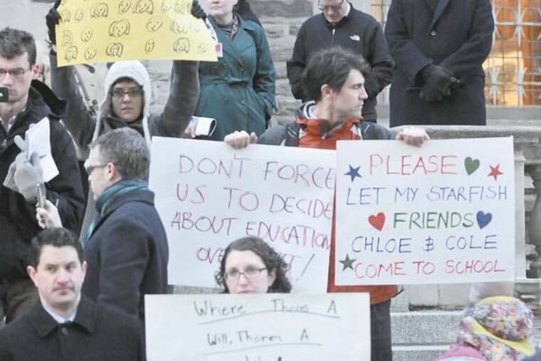 Angry parents protest outside Houston Hall on the University of Penn campus because the school district denied some children admission to Penn Alexander. ( RON TARVER / Staff Photographer )