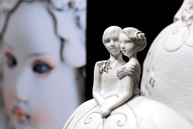 Wedding cake toppers by Kish & Company out of Denver Colorado, venders at the Marriage Equality's Same Sex Wedding Expo at the Convention Center, Jan. 25, 2015. (TOM GRALISH/Staff Photographer)