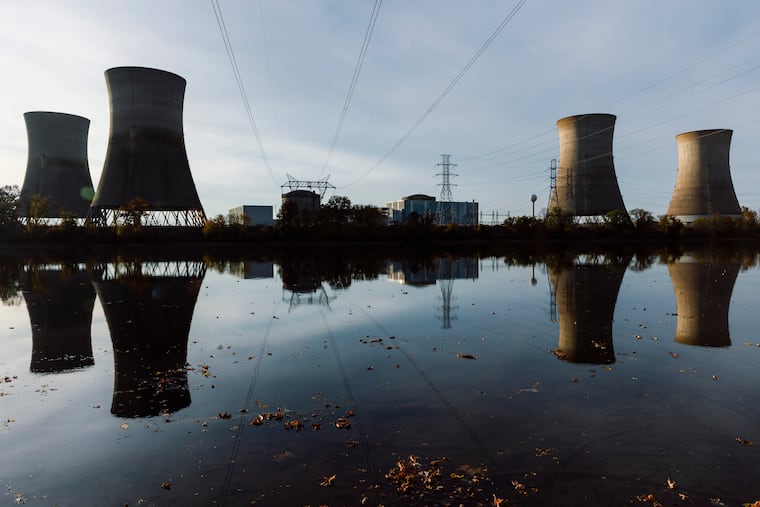 The cooling towers at Three Mile Island, which is being renamed Crane Clean Energy Center, are seen from across the Susquehanna River last year in Middletown, Pa.