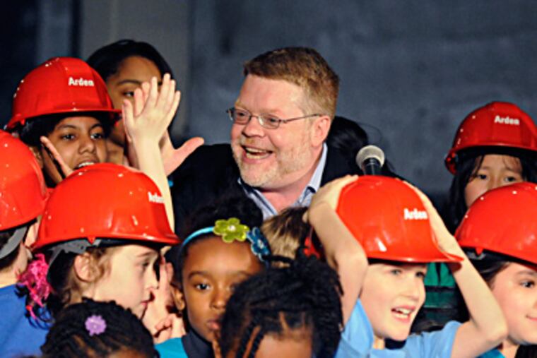 Terrence J. Nolen, producing artistic director of the Arden, amid children at the event. Programs will focus on youths. RON TARVER / Staff Photographer