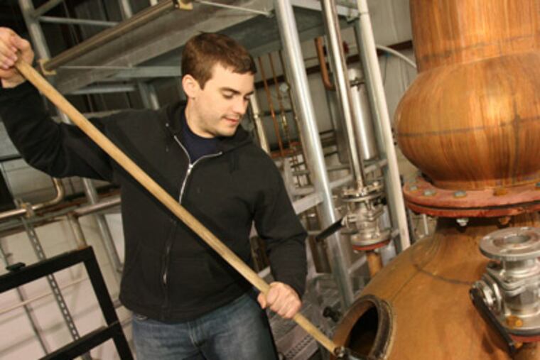 Robert Cassell of Philadelphia Distilling is part of the local vanguard of what might be a new wave of craft spirits. (CHARLES FOX / Staff Photographer)