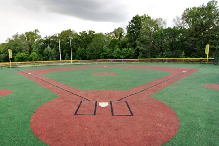 Rubber-surfaced field in Cherry Hill is almost ready and will offer "opportunities for the disabled and abled to play together," said a freeholder. (Elizabeth Robertson / Staff)