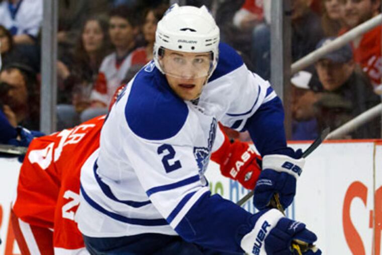 Luke Schenn, acquired by the Flyers on Saturday, will be reunited with his brother Brayden, a Flyers forward. (Rick Osentoski/AP)