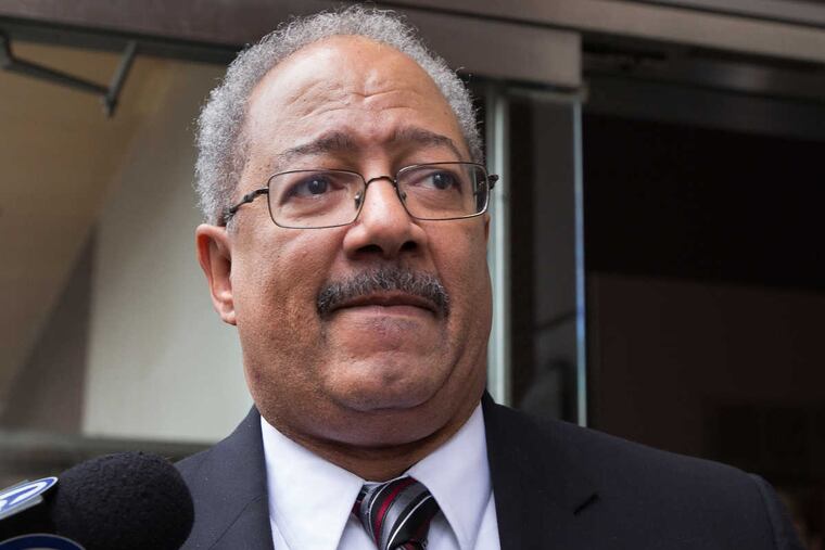 Former U.S. Rep. Chaka Fattah exits federal court after being sentenced to 10 years in prison Monday.
