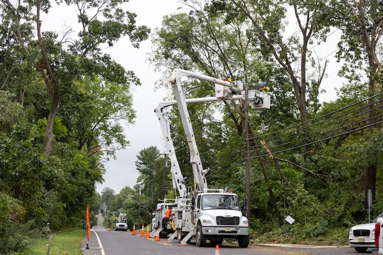 Workers checking out the power lines along Mantua Boulevard from Tuesday's storm on Wednesday, Sept. 2, 2026, in Mantua, N.J.