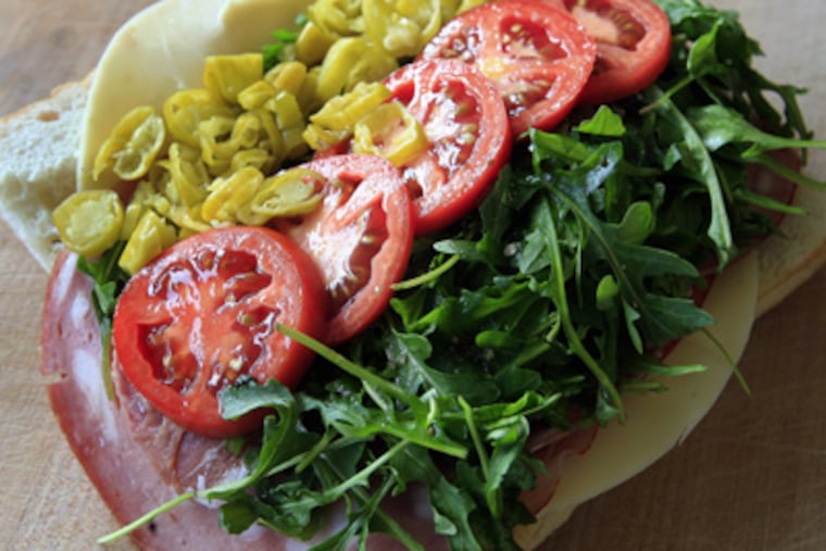 The winner: The Italian hoagie with mortadella, prosciutto and capicolla, sharp provolone and dark green lettuce, on a crispy seeded roll. (Akira Suwa / Staff Photographer)