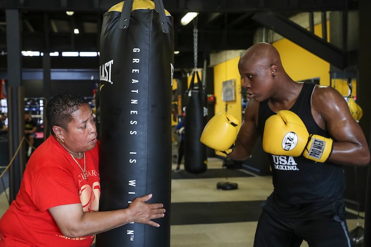 Shar’ron Baker (left) wants a championship fighter before she retires, and Atif Oberlton (right) has a chance to be the one.