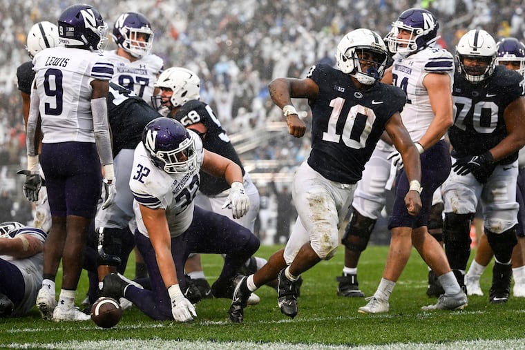 Penn State running back Nicholas Singleton (10) celebrates a touchdown against Northwestern on Oct. 1.