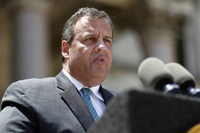 FILE - In this Tuesday, June 24, 2014, file photo, New Jersey Gov. Chris Christie addresses a gathering after he signed into law a bill that would extend the cap on arbitration awards to New Jersey's police and firefighters in Trenton. Christie's administration is facing an investigation into how it paid for a $1 billion repair of a New Jersey bridge. Two people said the investigation deals with whether funding for Pulaski Skyway repairs was misrepresented in bond documents by the Port Authority of New York and New Jersey. (AP Photo/Mel Evans, File)