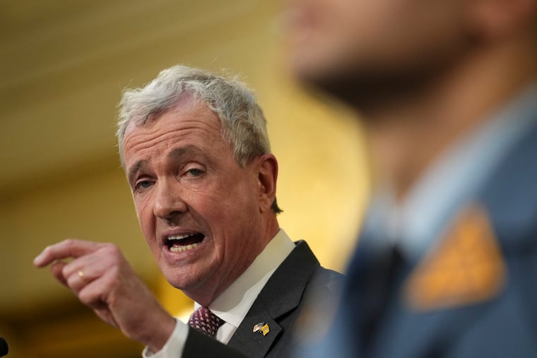 New Jersey Gov. Phil Murphy, pictured here delivering his 2023 State of the State address, is calling on bus companies to give notice before dropping off migrants headed for New York City.