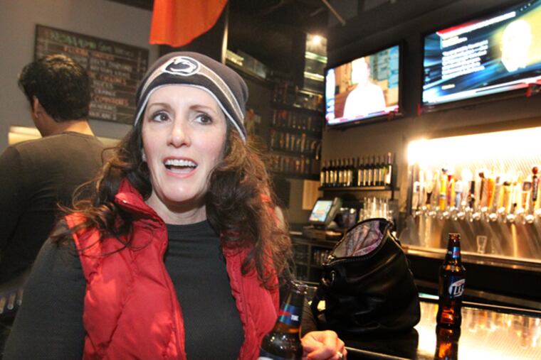 Penn State graduate Amy Lamoreau, class of 1994, talks Bill O'Brien leaving the university to take the coaching position with the Houston Texans. ( CHARLES FOX / Staff Photographer )