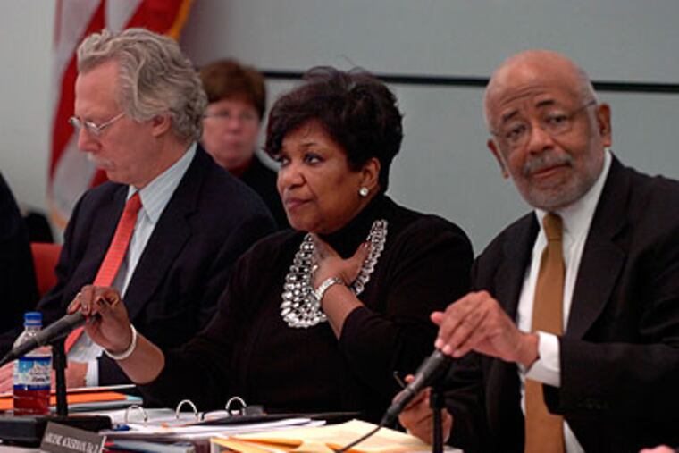 Arlene Ackerman (center), Robert Archie Jr. (right) and other reform commission members listen to the concerns of those impacted by the violence at South Philadelphia High School. (Sarah J. Glover / Staff Photographer)