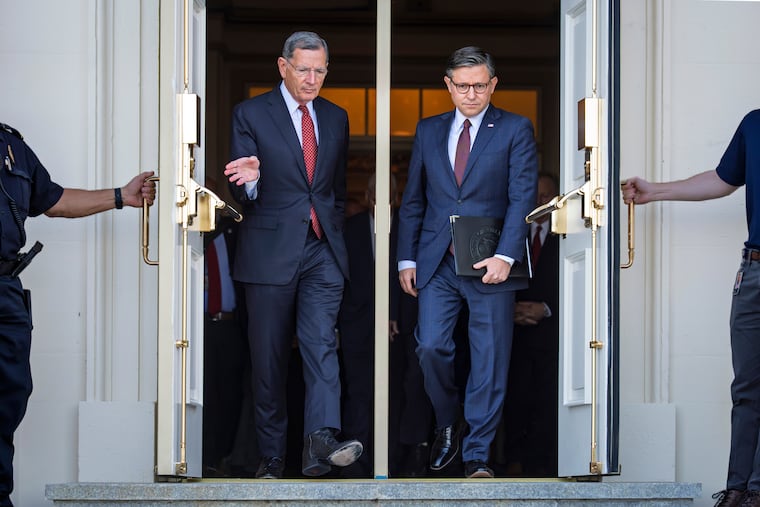 Sen. John Barrasso, R-Wyo., the Senate GOP whip, left, and Speaker of the House Mike Johnson, R-La., arrive for a news conference with top Republicans on the government shutdown, at the Capitol last month.