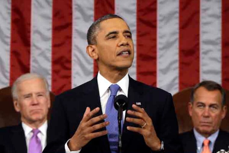 President Barack Obama, flanked by Vice President Joe Biden and House Speaker John Boehner of Ohio, gestures as State of the Union address during a jointhe gives his session of Congress on Capitol Hill in Washington, Tuesday Feb. 12, 2013. (AP Photo/Charles Dharapak, Pool)