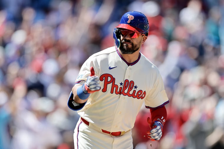 Phillies designated hitter Kyle Schwarber raises his thumb after hitting a third-inning, three-run homer against the Arizona Diamondbacks.