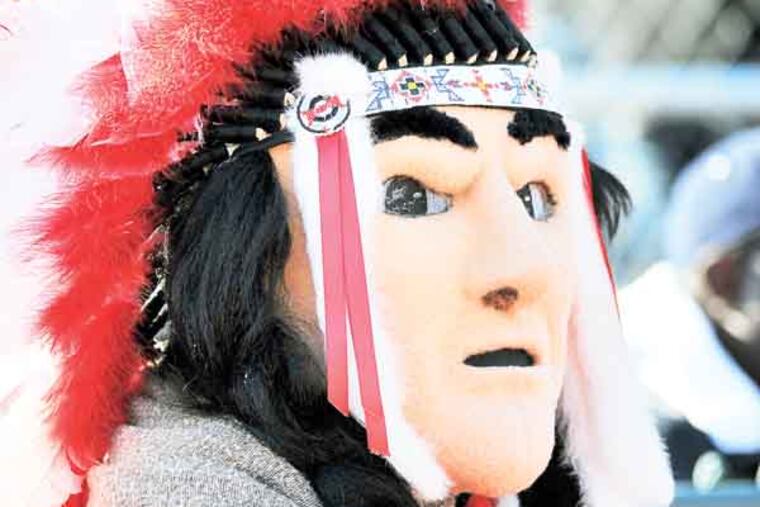 The Radnor Raiders mascot, a Native American caricature, watches the action at the 115th meeting of Radnor and Lower Merion High School football teams November 12, 2011 in Radnor, PA (c) Aspenphoto | Dreamstime.com