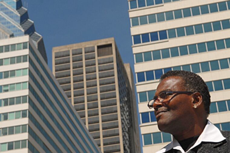 Tony Moses, who was homeless and now is studying behavioral science, was at the mayor's press conference where he outlined a new plan to help the city's homeless. (Peter Tobia / Inquirer)