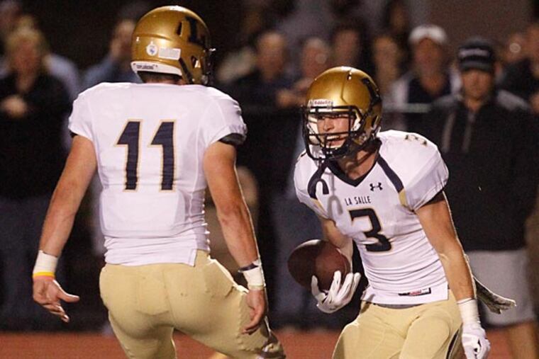 La Salle's Jimmy Herron (right) celebrates his touchdown reception with Charlie Hemcher. (Ron Cortes/Staff Photographer)