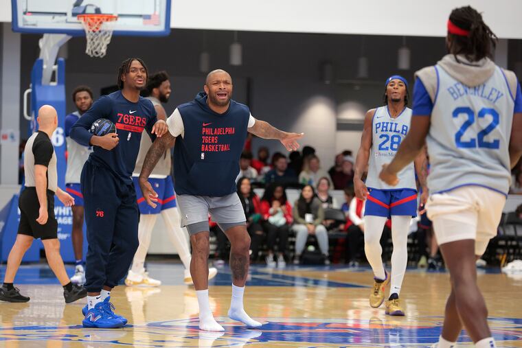The Sixers held their annual Blue/White Scrimmage at Chase Fieldhouse Saturday. Following the game, Tyrese Maxey (left) and P.J. Tucker (center) give Patrick Beverley (right) a hard time after the white team he coached lost the scrimmage.