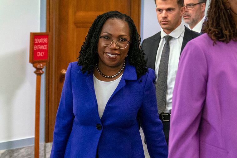 Supreme Court nominee Ketanji Brown Jackson arrives for her Senate Judiciary Committee confirmation hearing on Capitol Hill.