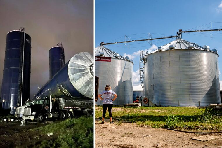 Marianne Eachus pausing by two new grain silos, right, in Mullica Hill on Aug. 29, 2022, a year after an EF-3 tornado that followed Hurricane Ida nearly destroyed all of Wellacrest Farms’ barns, silos, and buildings, some collapsing on the cows. In the photo at left, taken by her daughter-in-law Karlie Eachus just after the tornado hit, one of the 80-foot silos toppled by the powerful winds had landed on top of their trucks.