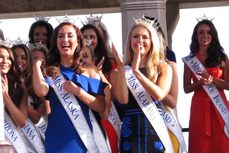 In this Aug. 30, 2017 photo, contestants attend a welcoming ceremony for the Miss America competition on the Atlantic City, N.J. Boardwalk.