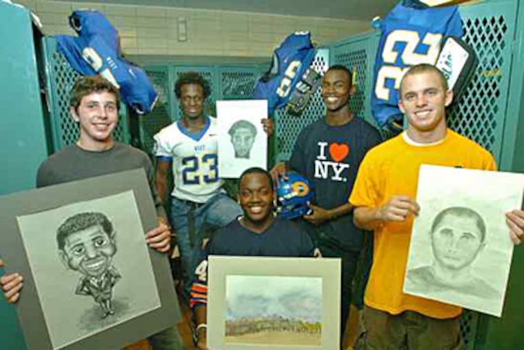 Art majors at Downingtown West, with samples of their work, are (from left) Evan Trexler, senior; Trey Faust, junior; Mack Crowell, senior; Louis Smith, junior, and Matt Finkbohner, senior. (Clem Murray / Staff)