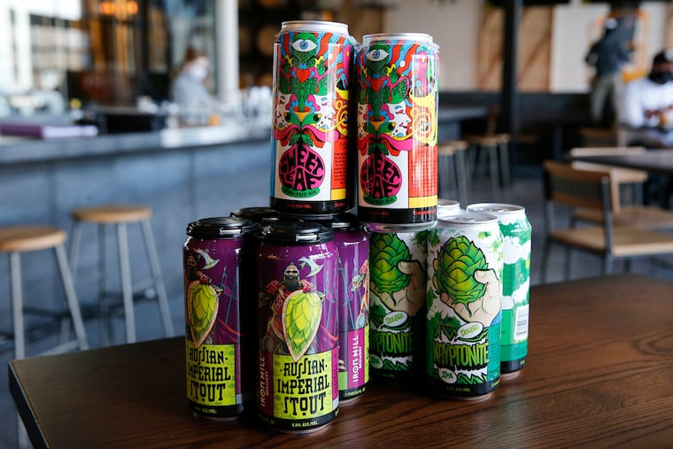 Iron Hill Brewery's Russian Imperial Stout (bottom left), Sweet Leaf India Pale Ale (top center) and Double Kryptonite IPA are shown in this 2020 file photo.
