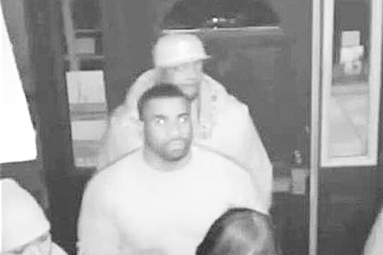 The bearded man in the center is wanted in the shooting death of Timothy Loper Jr., who was killed in Camden early Sunday.