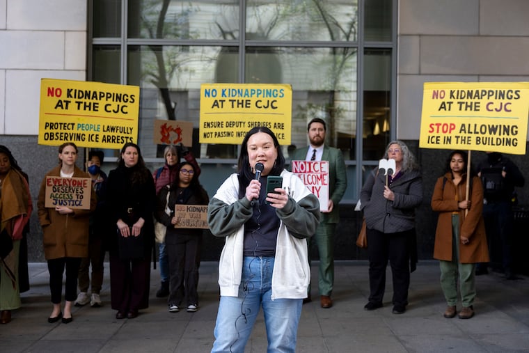 Elena Emelchin Brunner, an immigrant rights organizer at Asian Americans United, speaks at a rally and news conference to stop ICE arrests at the courthouse in Philadelphia on Tuesday.