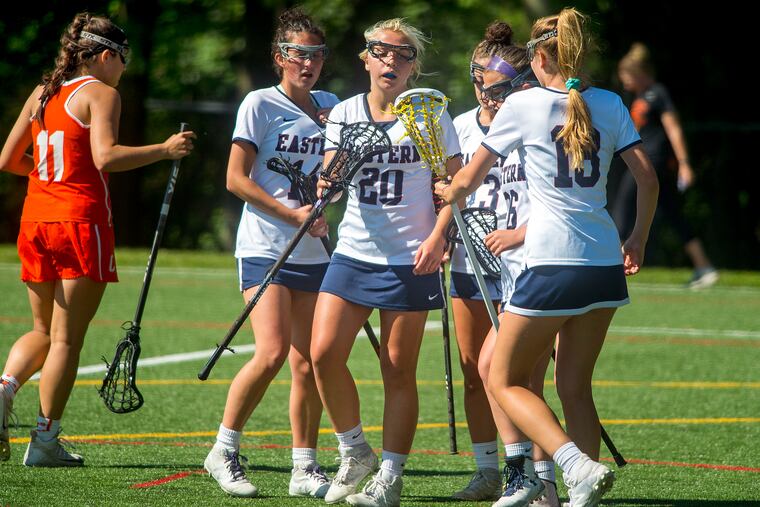 Eastern's Ryleigh Heck (#20) is congratulated by teammates after scoring her third goal in the first half. She went on to score two more goals in the second half to lead the Vikings to a 14-4 win over Cherokee in the South Group 4 semifinals.