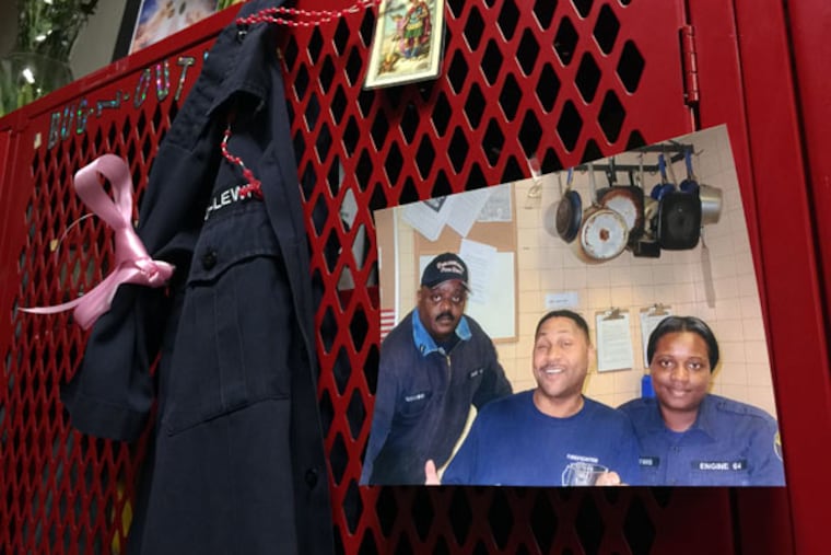 Joyce Craig-Lewis' locker. From left, Lt. Benny Hutchins, Lt. Steven Giles and Craig-Lewis the day Giles got promoted this year.