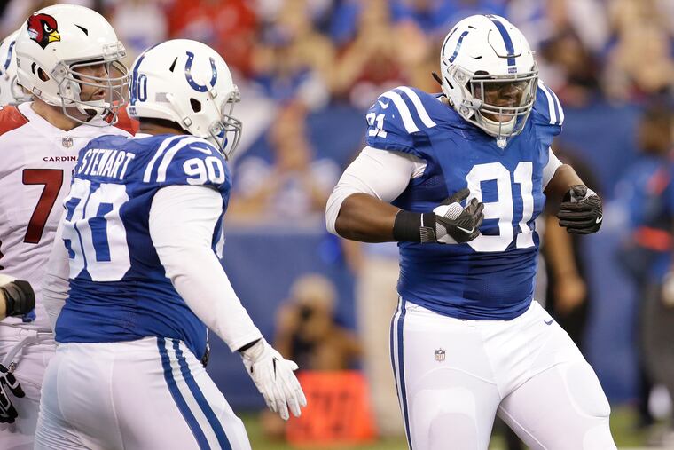 Hassan Ridgeway (right), here celebrating a sack for the Colts in September 2017, joined the Eagles in a draft-weekend trade.
