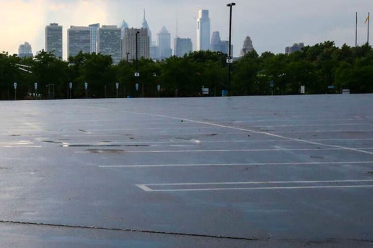 A Camden parking lot that is the future site, with a tax assist, of the 76ers' new practice facility and offices. (Steven M. Falk / Staff Photographer)