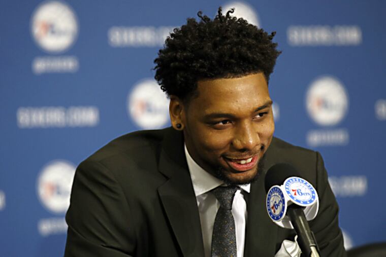 Philadelphia 76ers 2015 first round, 3rd overall, draft pick Jahlil Okafor smiles while meeting the local media at Philadelphia College of Osteopathic Medicine basketball court on Saturday, June 27, 2015. (Yong Kim/Staff Photographer )
