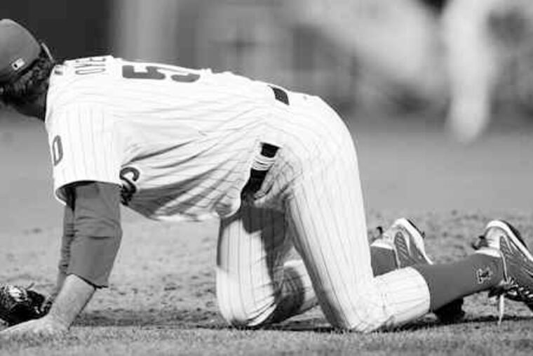 Jamie Moyer was hurt on his last pitch in win over Astros.