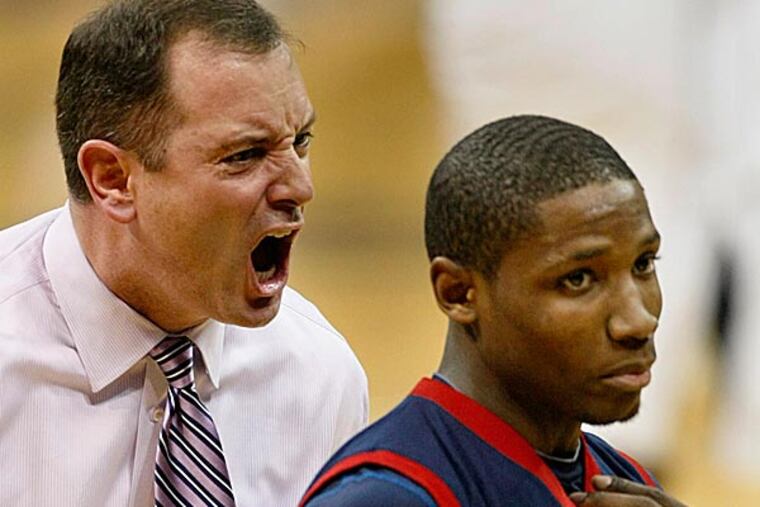 A Robert Morris internal investigation into former basketball coach Mike Rice found no evidence of the "coaches against player" brawls alleged by an ex-Rutgers employee. (Keith Srakocic/AP)