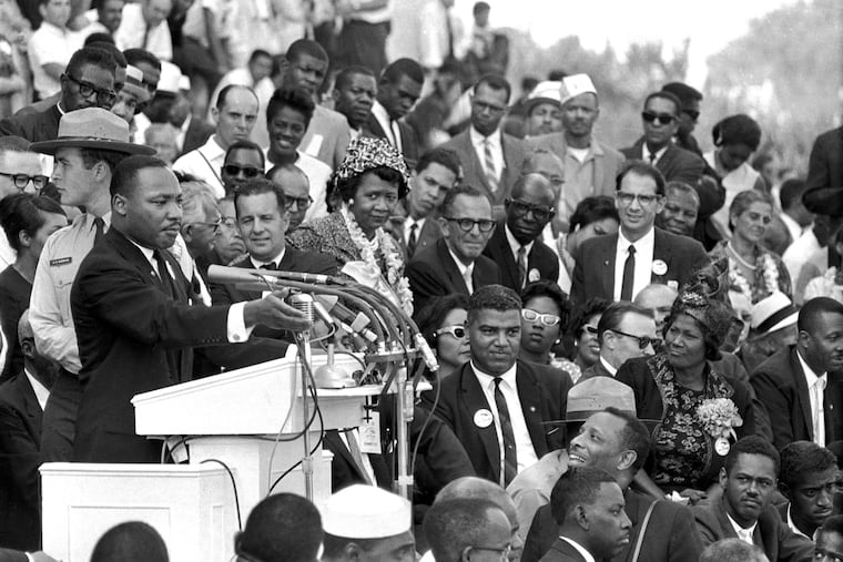In this Aug. 28, 1963 file photo, the Rev. Dr. Martin Luther King Jr., head of the Southern Christian Leadership Conference, speaks to thousands during his "I Have a Dream" speech in front of the Lincoln Memorial for the March on Washington for Jobs and Freedom, in Washington, D.C.