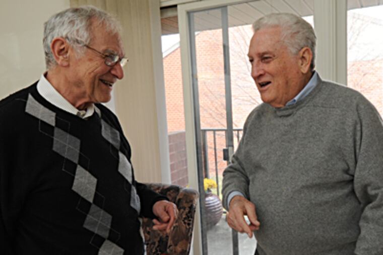Joined by fate: In 1945, Ernie Gross (left) was destined to die at Dachau. Don Greenbaum was a U.S. liberator. "Ich bin ein Jude," Greenbaum recalls telling wretched survivors. "I am a Jew." (April Saul / Staff Photographer)