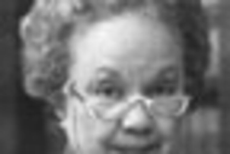 pwhite20 06/17/04 Judge Juanita Kidd Stout at a line of law books in her office. (10/20/1988).