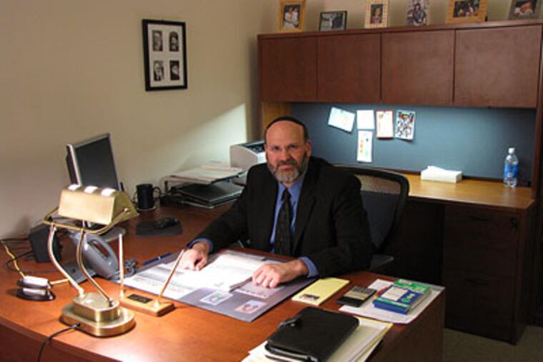 Douglas E. Gershuny, executive director of South Jersey Legal Services, Inc., at his desk in Camden, N.J. (Photo courtesy of South Jersey Legal Services)