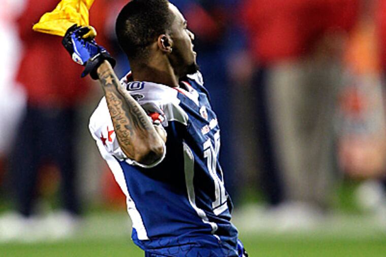 Philadelphia Eagles wide receiver DeSean Jackson picks up a flag during last weekend's Pro Bowl. (AP Photo/David J. Phillip)