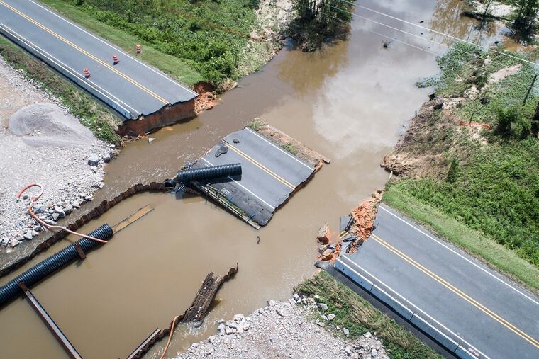 River flooding in North Carolina. Rains been devastating in parts of the country, but they might be holding down early-summer temperatures.