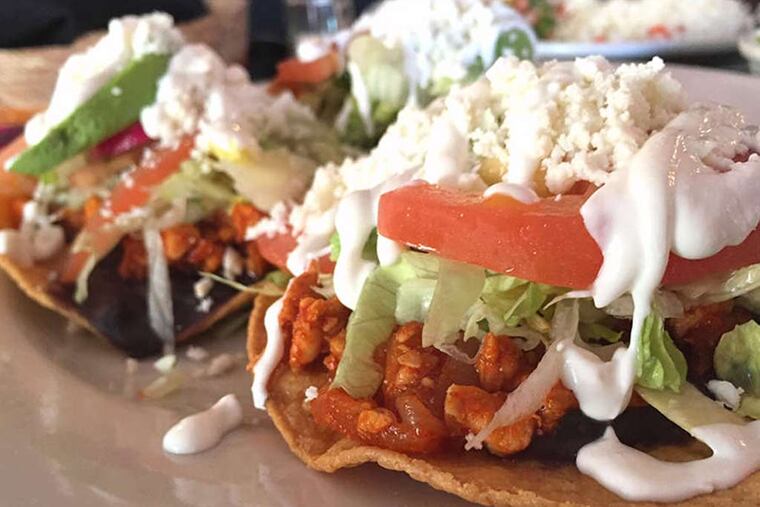 Tostadas de tinga…from Mole Poblano (1144 S. 9th St.) (Craig LaBan / Staff)