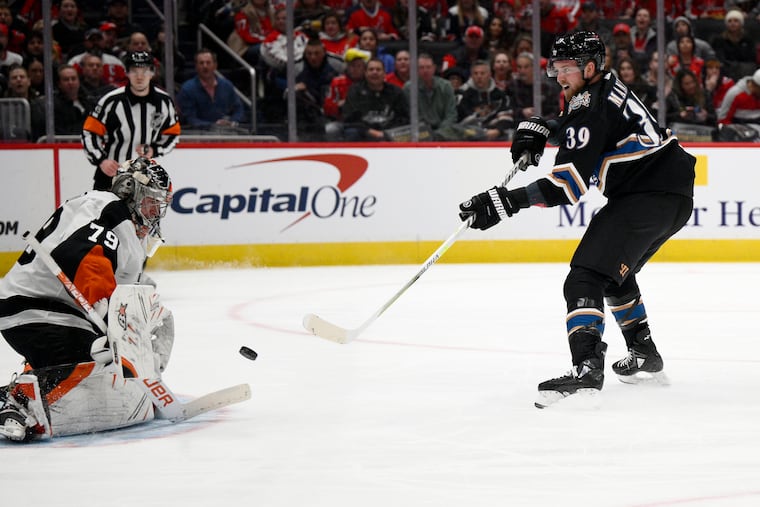 Flyers goalie Carter Hart prepares to stop a shot by Washington Capitals right wing Anthony Mantha (39) in the first period. Hart finished with 39 saves.