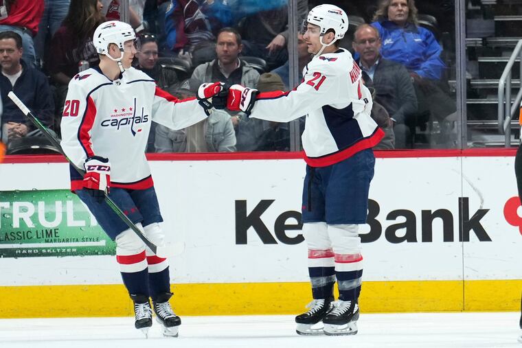Washington Capitals right wing Garnet Hathaway (21) celebrates a goal with Lars Eller against the Colorado Avalanche last season. Hathaway, who was traded to the Boston Bruins at the deadline, signed with the Flyers on Saturday.