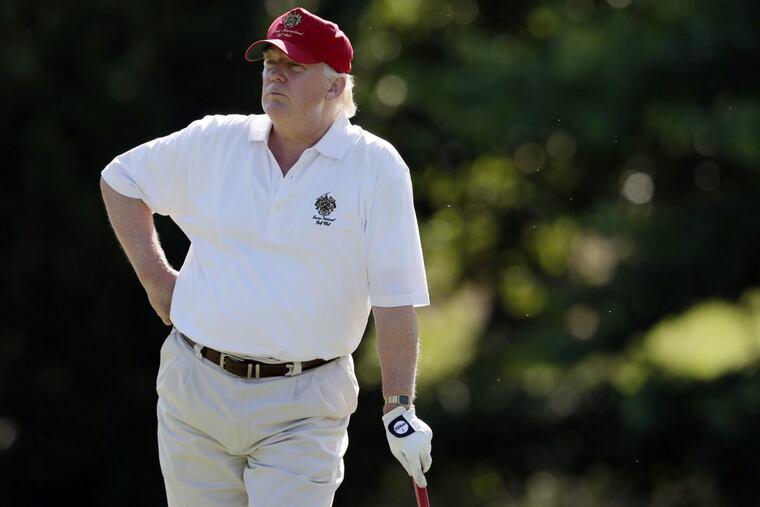 FILE – In this June 27, 2012, file photo, Donald Trump stands on the 14th fairway during a pro-am round of the AT&T National golf tournament at Congressional Country Club in Bethesda, Md. The American developer has agreed to buy Turnberry Resort, famous for its Ailsa Course that has hosted the British Open three times. Terms of the deal were not disclosed. The Independent in London reported that Trump paid Dubai-based Leisurecorp just over $63 million (37.5 million pounds). (AP Photo/Patrick Semansky, File)